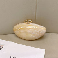 Odessa | Bullet-Shaped Clutch Bag